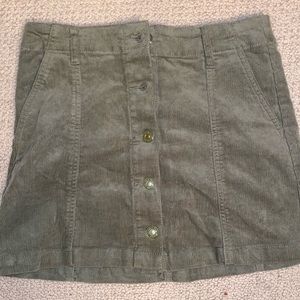 Green denim mini skirt